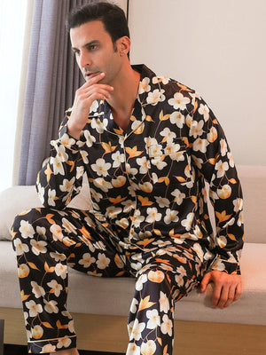 Heren zwarte satijnen pyjama met gele bloesemprint