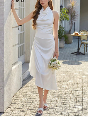 Lange witte satijnen jurk