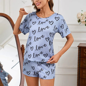 Lichtblauwe satijnen shortama dames met hartjes en 'love' print