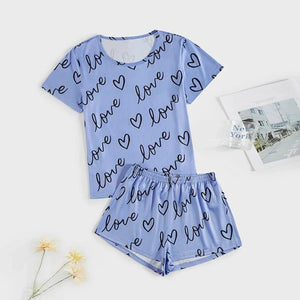 Lichtblauwe satijnen shortama dames met hartjes en 'love' print