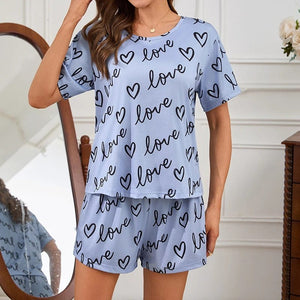 Lichtblauwe satijnen shortama dames met hartjes en 'love' print Lichtblauw / S