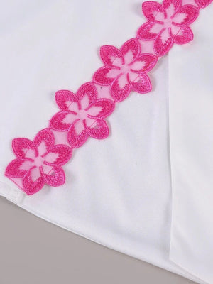 Wit satijnen halter jurkje met bloemen split