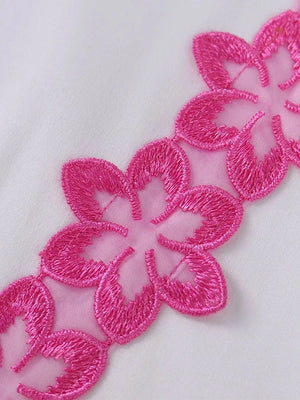 Wit satijnen halter jurkje met bloemen split