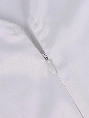 Wit satijnen halter jurkje met bloemen split