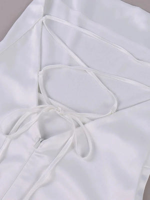 Wit satijnen halter jurkje met bloemen split