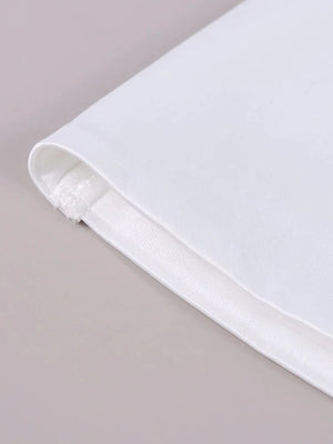 Wit satijnen halter jurkje met bloemen split