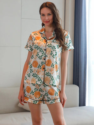 Witte satijnen shortama dames met bloemenprint