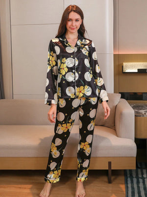 Zwarte lange satijnen pyjama dames met bloemenprint