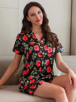 Zwarte satijnen shortama dames met rozenprint Zwart / S