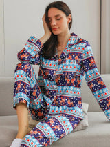 Donkerblauwe satijnen kerstpyjama dames met rendier print Blauw / S