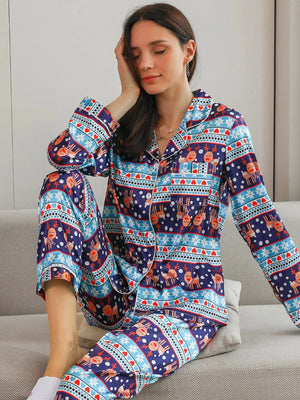 Donkerblauwe satijnen kerstpyjama dames met rendier print Blauw / S