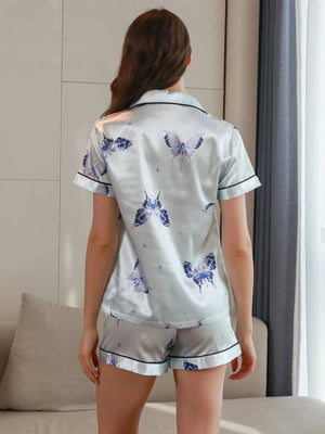 Lichtblauwe satijnen shortama dames met vlinderprint