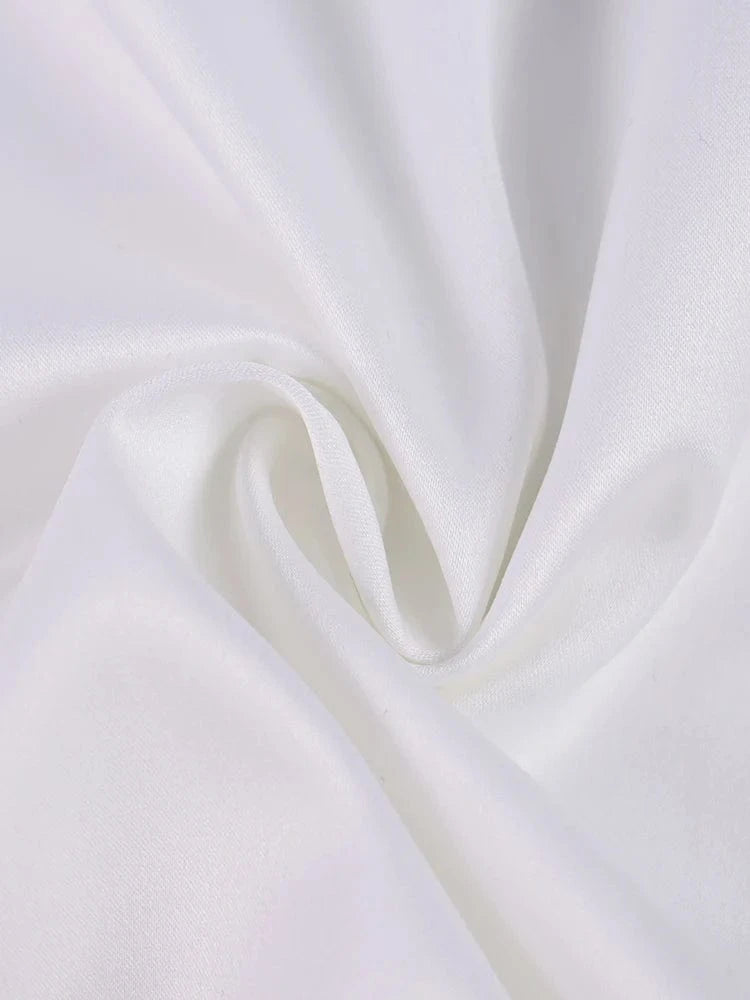 Wit satijnen halter jurkje met bloemen split