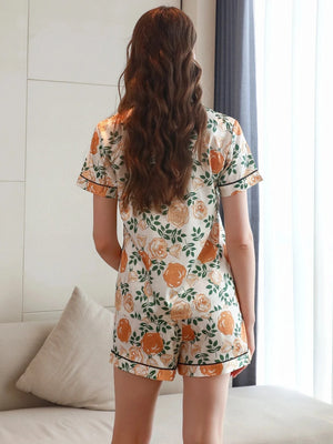 Witte satijnen shortama dames met bloemenprint