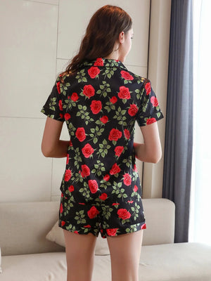 Zwarte satijnen shortama dames met rozenprint